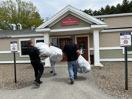 Sullivan Tire team delivering sock donations to Hope House