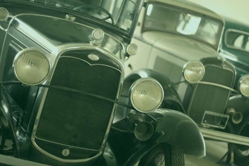 Image of a few older model T like cars